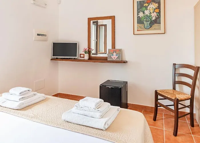 Welcomely - Kadossene Penzion Alghero